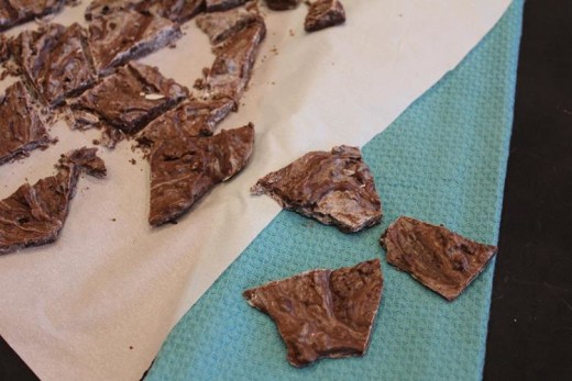 Cookie Bark pieces on white, blue and black background