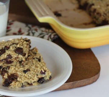 orange cranberry baked oatmeal in a yellow dish