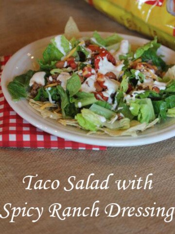 taco salad with spicy dressing and chips