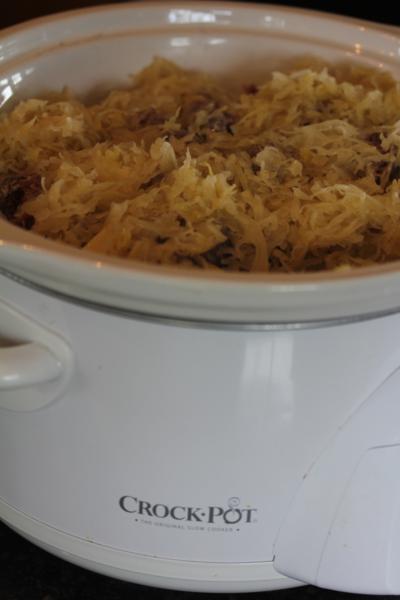 slow cooked sausage sauerkraut and potatoes