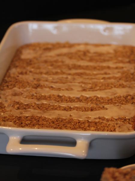 cinnamon roll baked oatmeal in a white pan