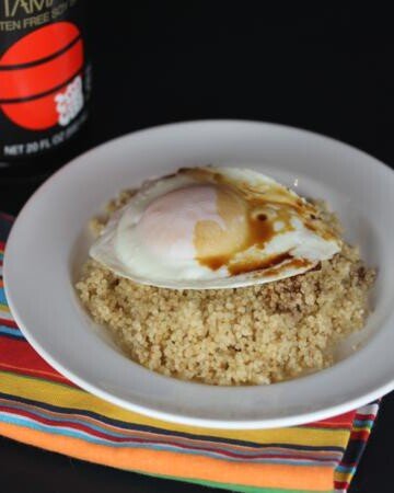 eggs and soy sauce over quinoa