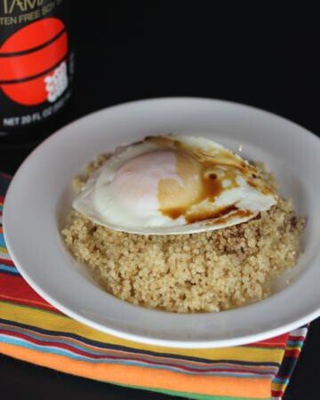 eggs and soy sauce over quinoa