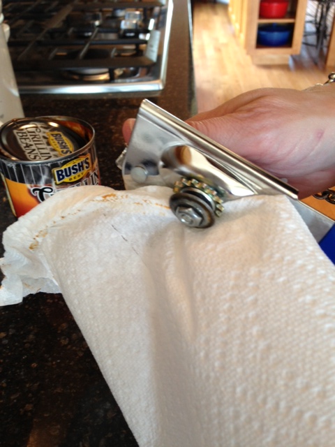 cleaning a can opener _