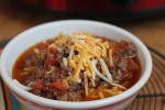 chili is bowl with cheese