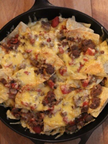 chili nachos in cast iron pan