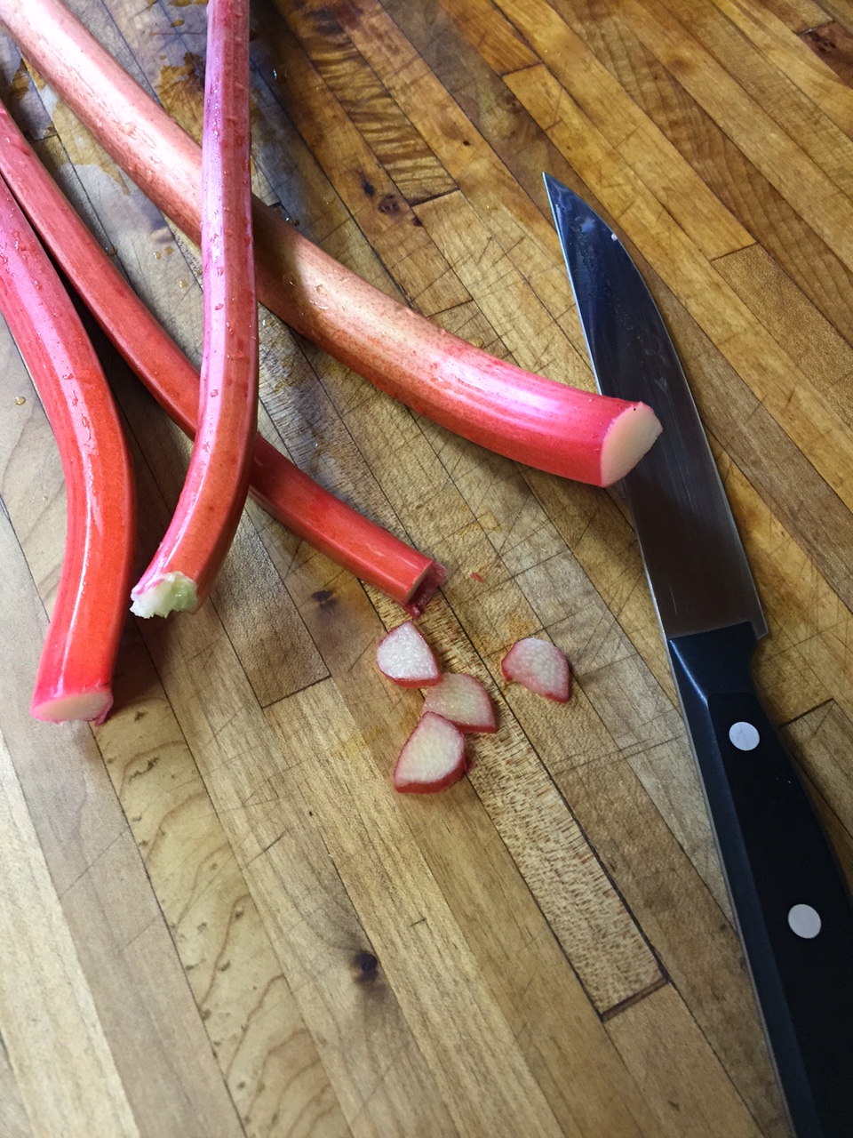 rhubarb and knife on cutting board