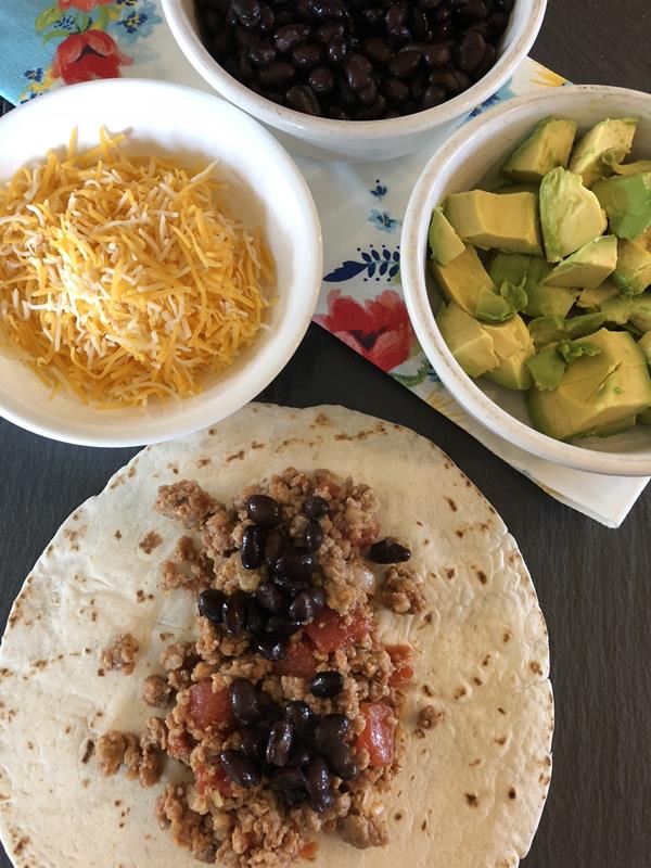 Sausage Tacos with black beans and cheese