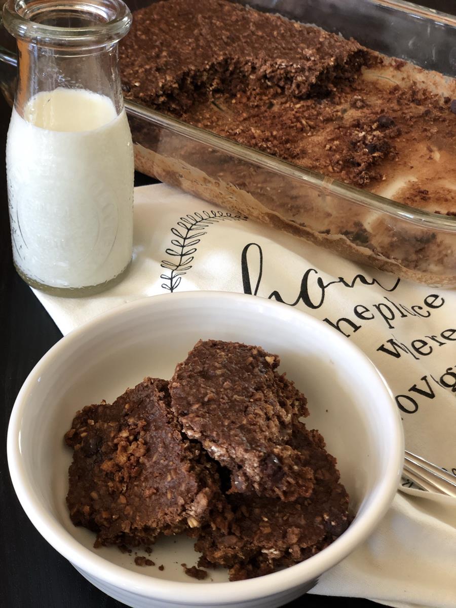 Double-Chocolate-Baked-Oatmeal in a bowl with milk