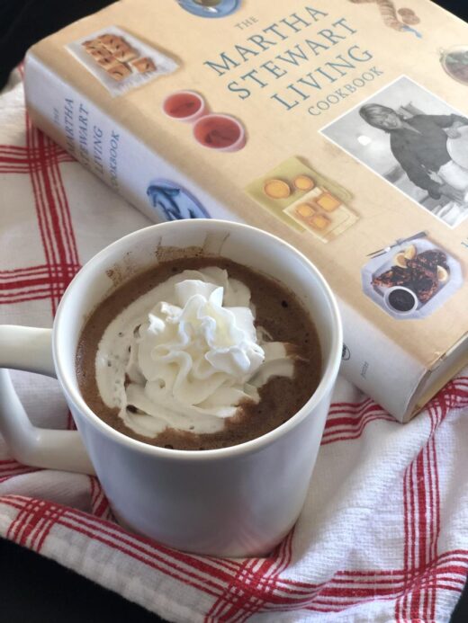 Martha Stewart's Hot Chocolate with whipping cream and cookbook