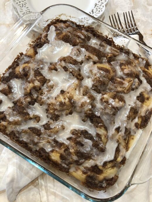 Cinnamon Roll Muffin Cake Recipe in square glass pan