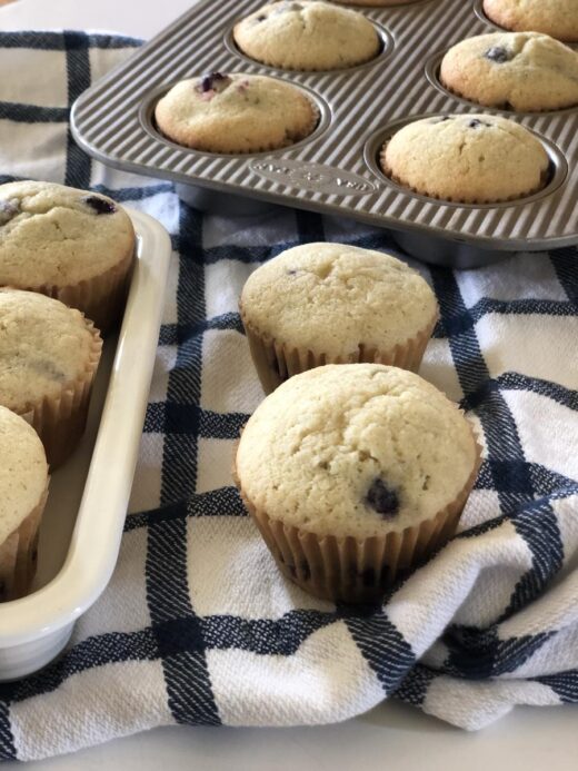 Blueberry Muffins in pan and on plate