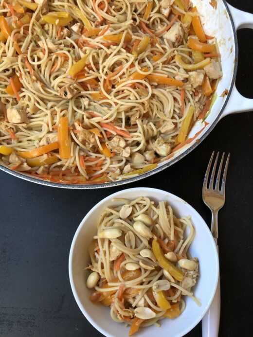 Chicken Peanut Noodles Recipe in white pan and white bowl