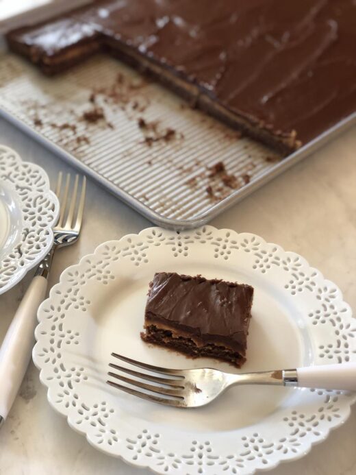 Frosted Peanut Butter Brownies Recipe on white plate