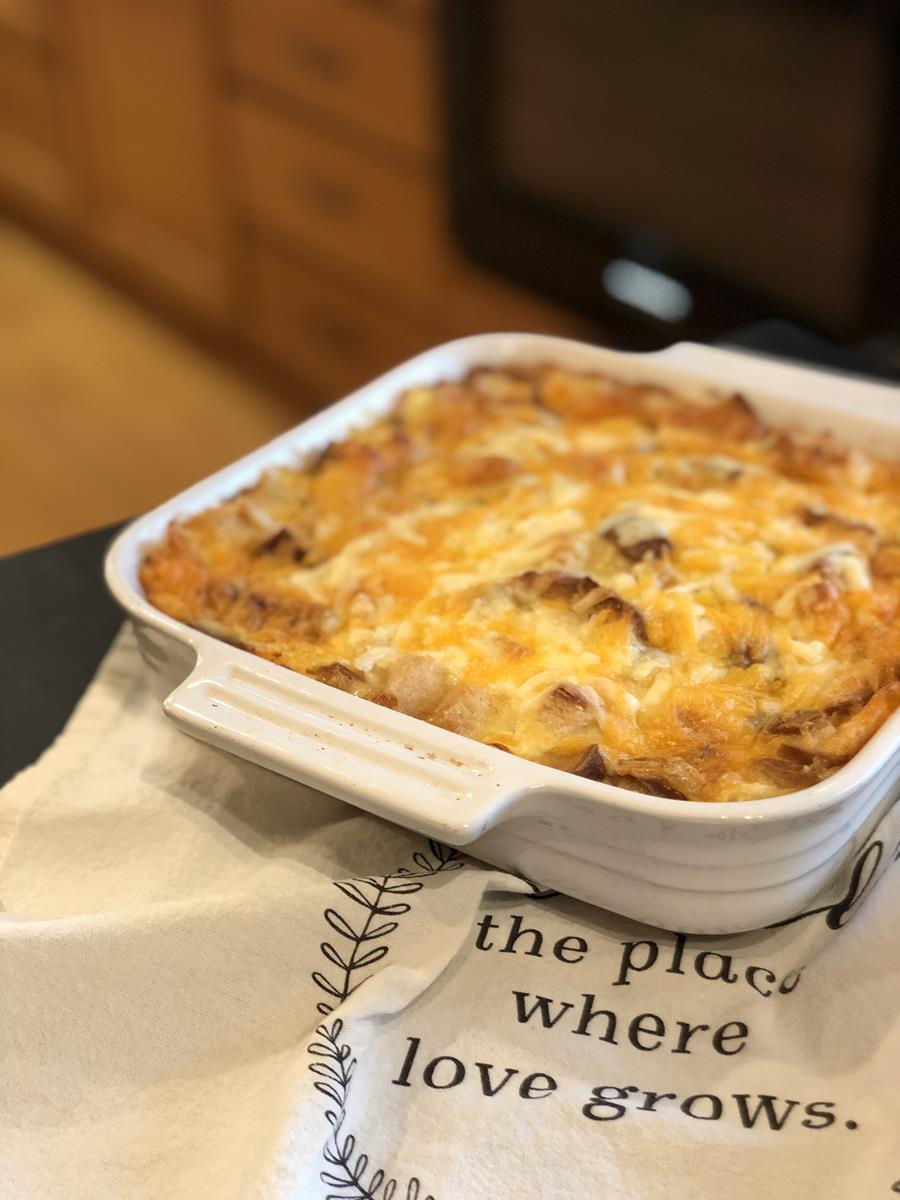 breakfast casserole in white dish on counter