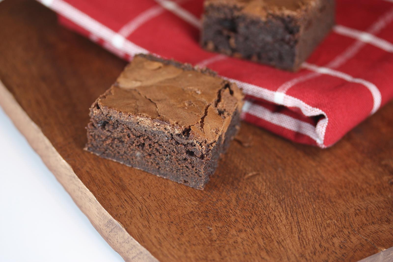 gluten free brownie on board with red napkin