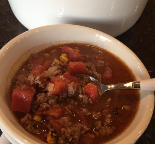 bowl of taco soup without beans in a white bowl
