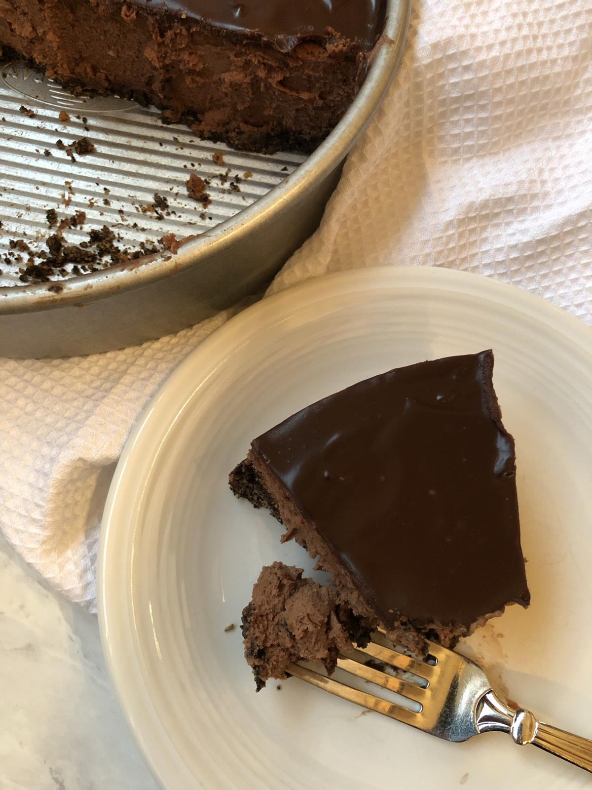 Martha Stewart's Triple Chocolate Cheesecake on white plate