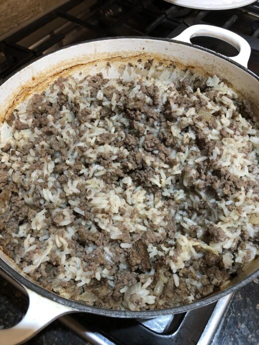 ground beef and rice in a pan