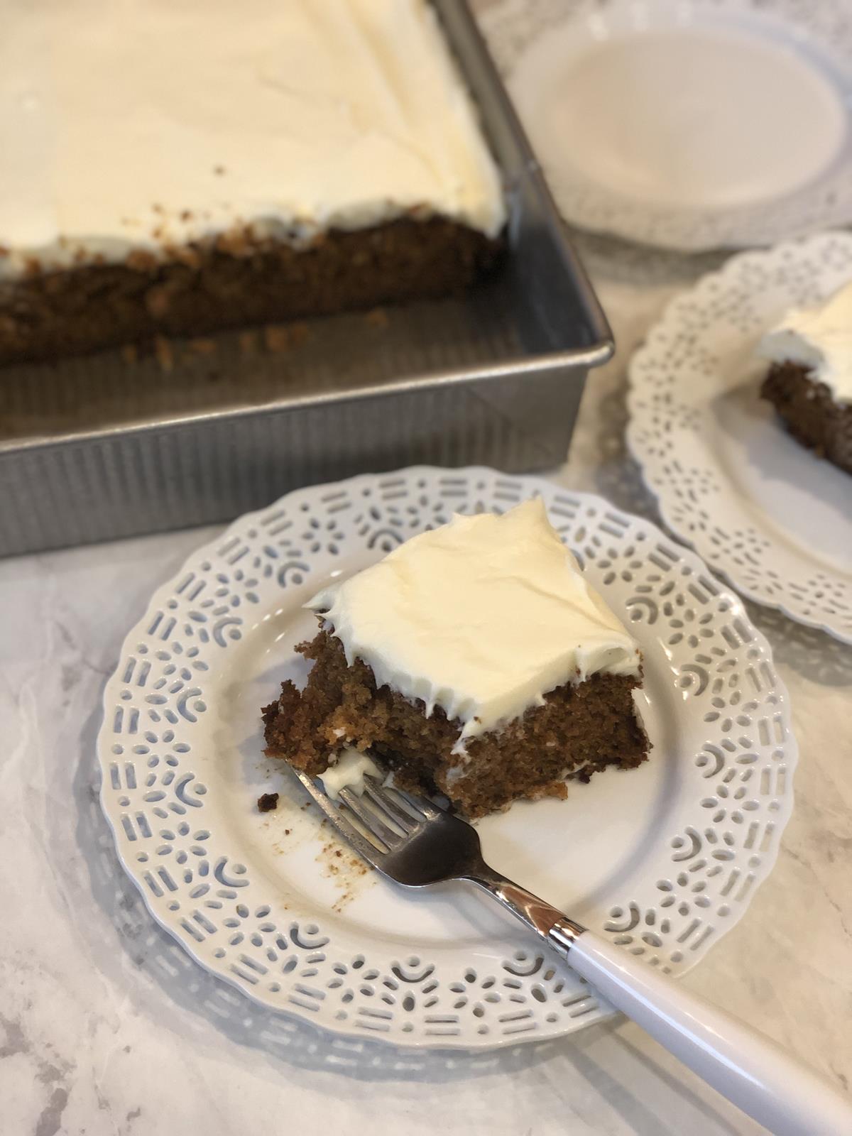 Gluten free carrot cake on white plate