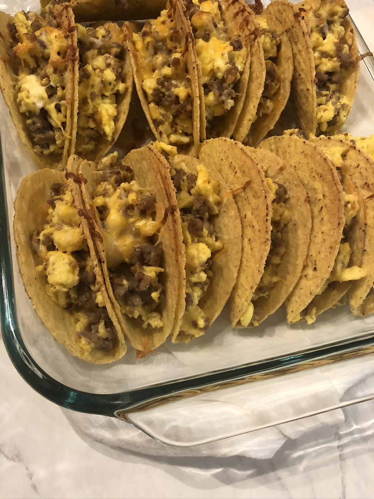 baked tacos in glass dish
