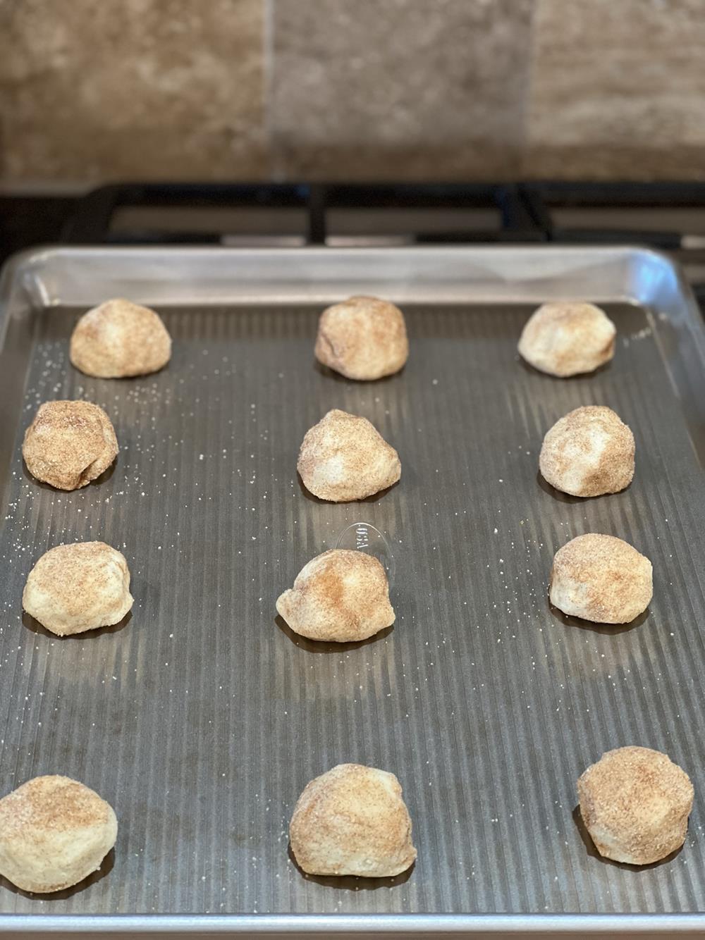 Snickerdoodle dough on cookie sheet