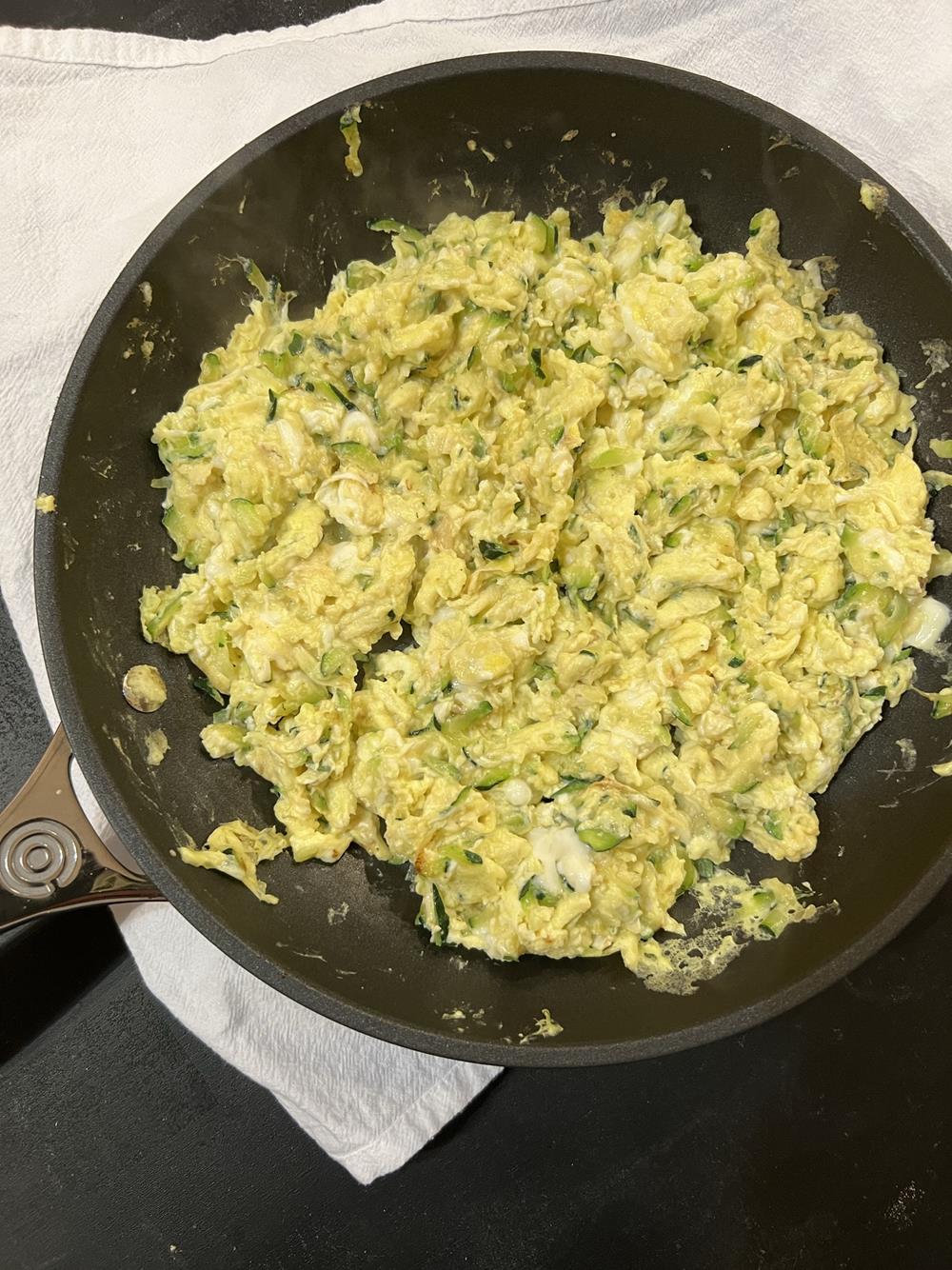 Eggs and Zucchini in a pan