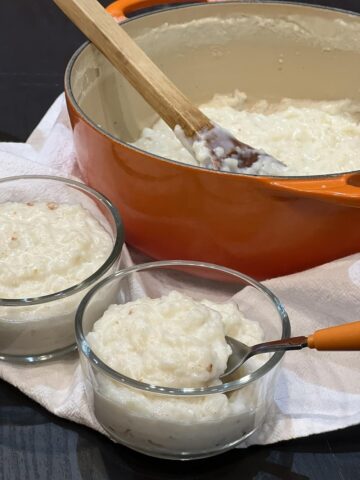 Stove Top Rice Pudding in glass bowl with white cloth