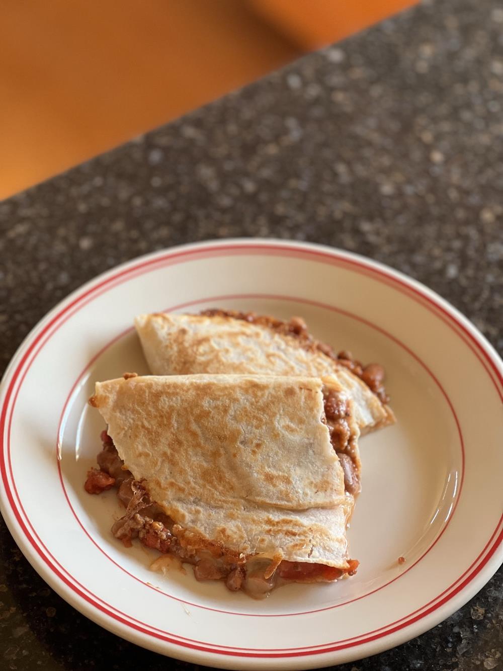 Chili Cheese Quesadilla on plate on counter
