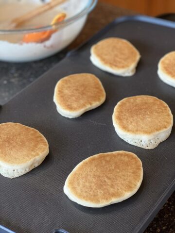 GF sourdough pancakes on griddle