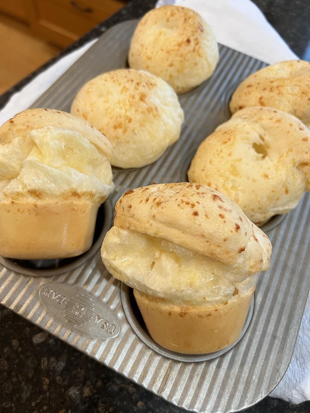 Gluten Free Cheese Popovers in pan on white cloth