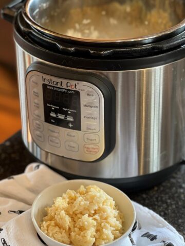 Instant Pot and Cheese rice in white bowl