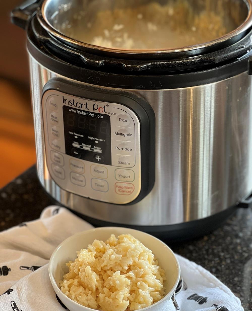 Instant Pot and Cheese rice in white bowl