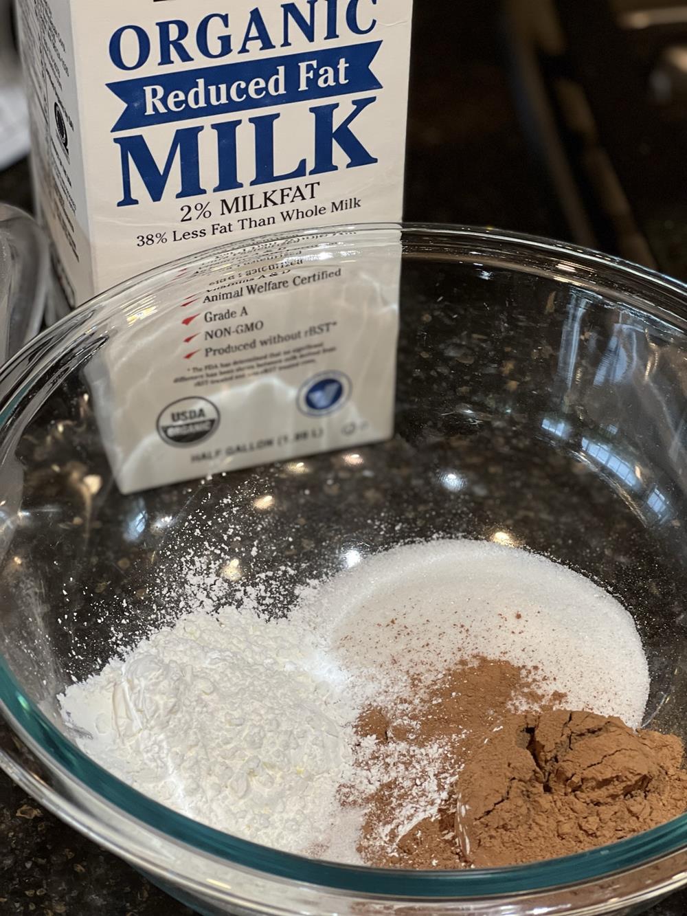 Homemade pudding ingredients in glass bowl