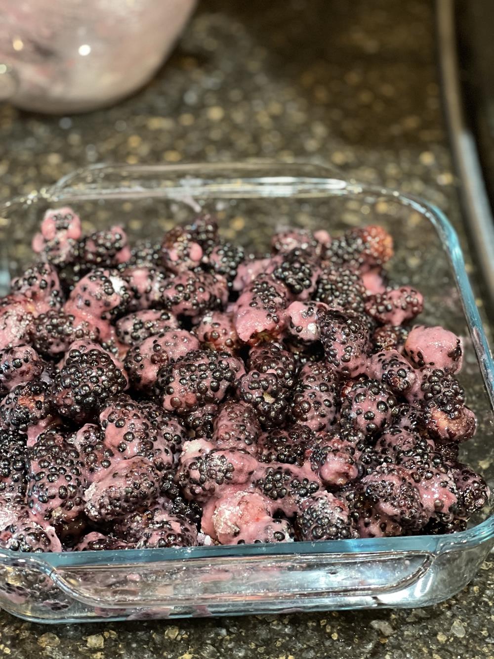 blueberries and sugar in pan