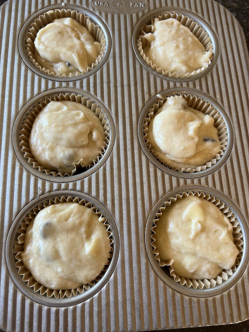 banana muffin batter in pan