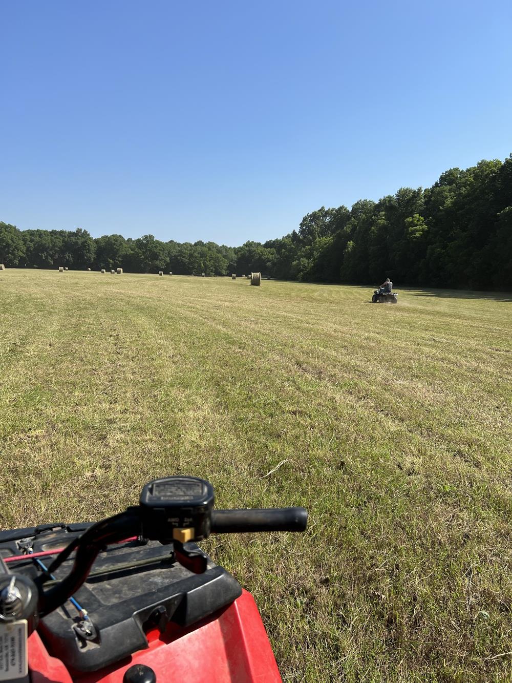 hayfield and four wheeler