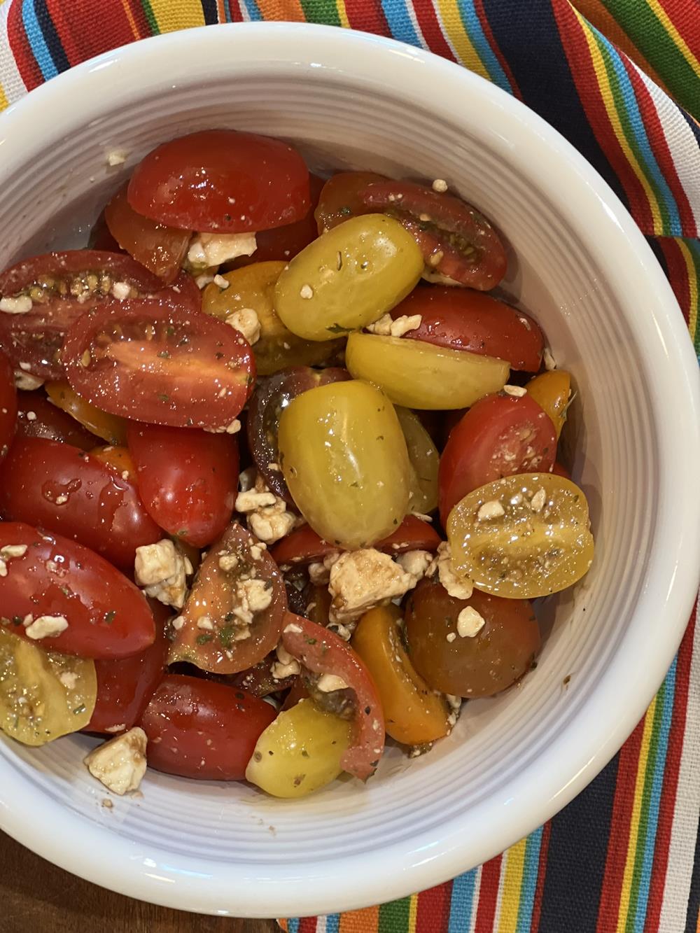 tomato salad in a bowl white bowl