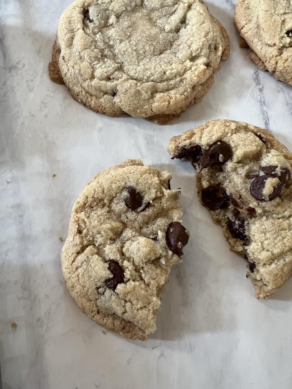 chocolate chip cookie on white marble counter
