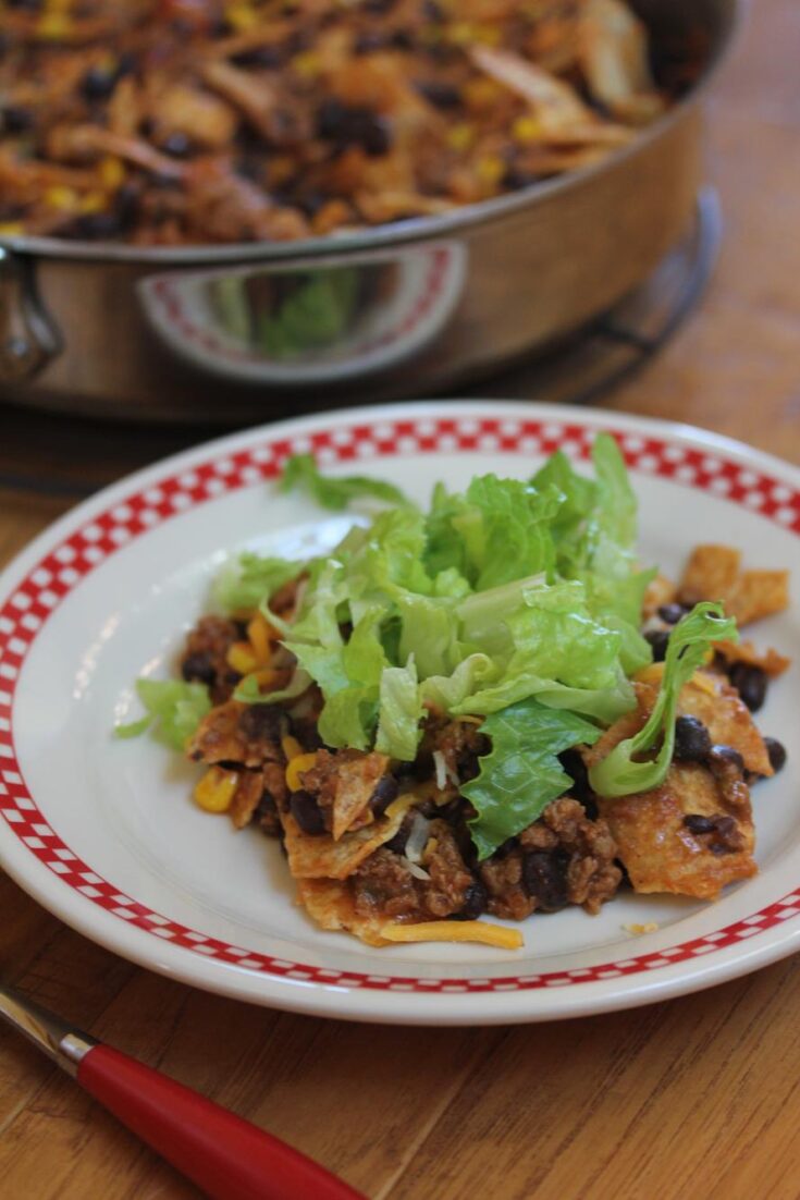 Taco Dinner on plate with skillet in background