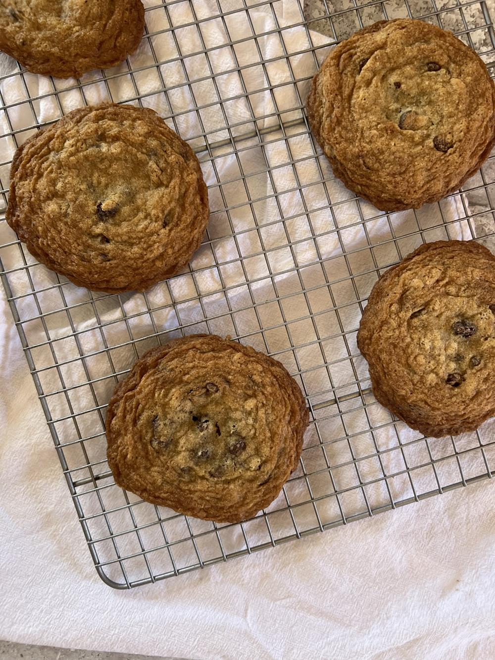 gluten free oatmeal cookies on cooling rack on white napkin