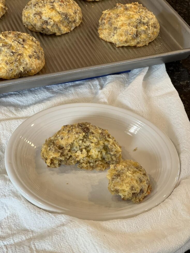 Flourless breakfast rolls on white plate with white napkin