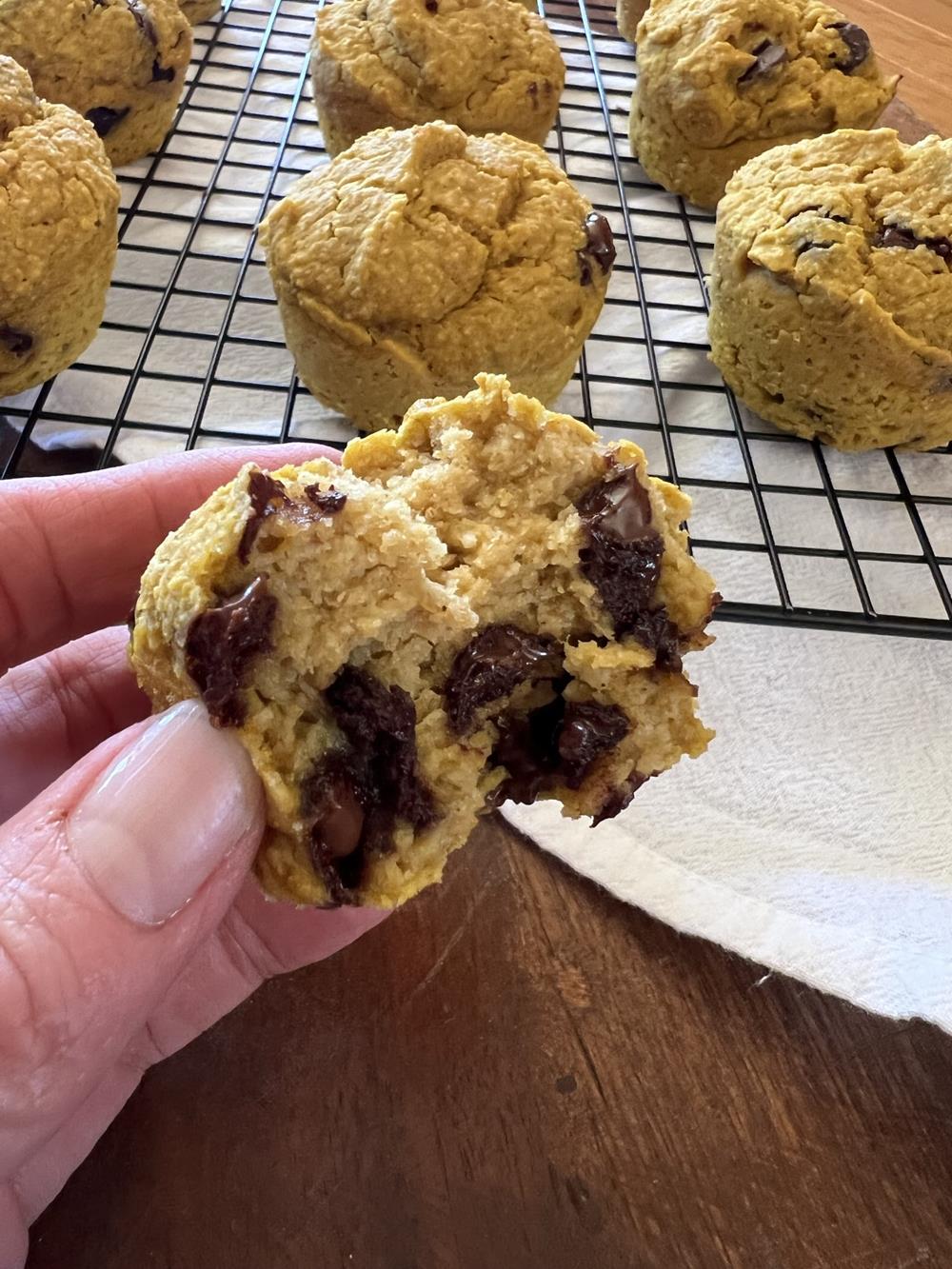 hand holding Oatmeal Pumpkin Muffins with Chocolate Chips