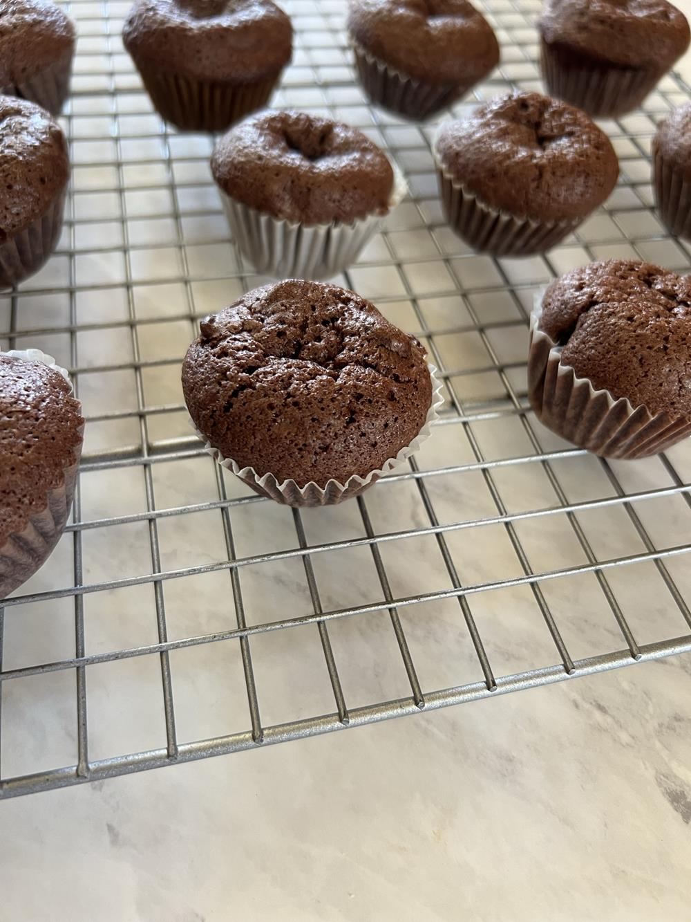 Chocolate brownie bites on cooling rack