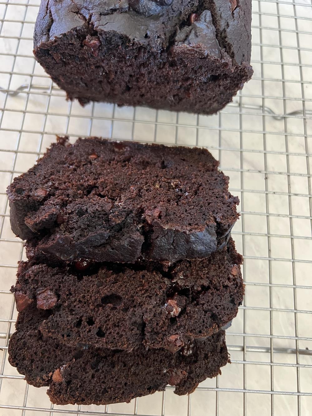 gluten free chocolate pumpkin bread sliced on wire rack