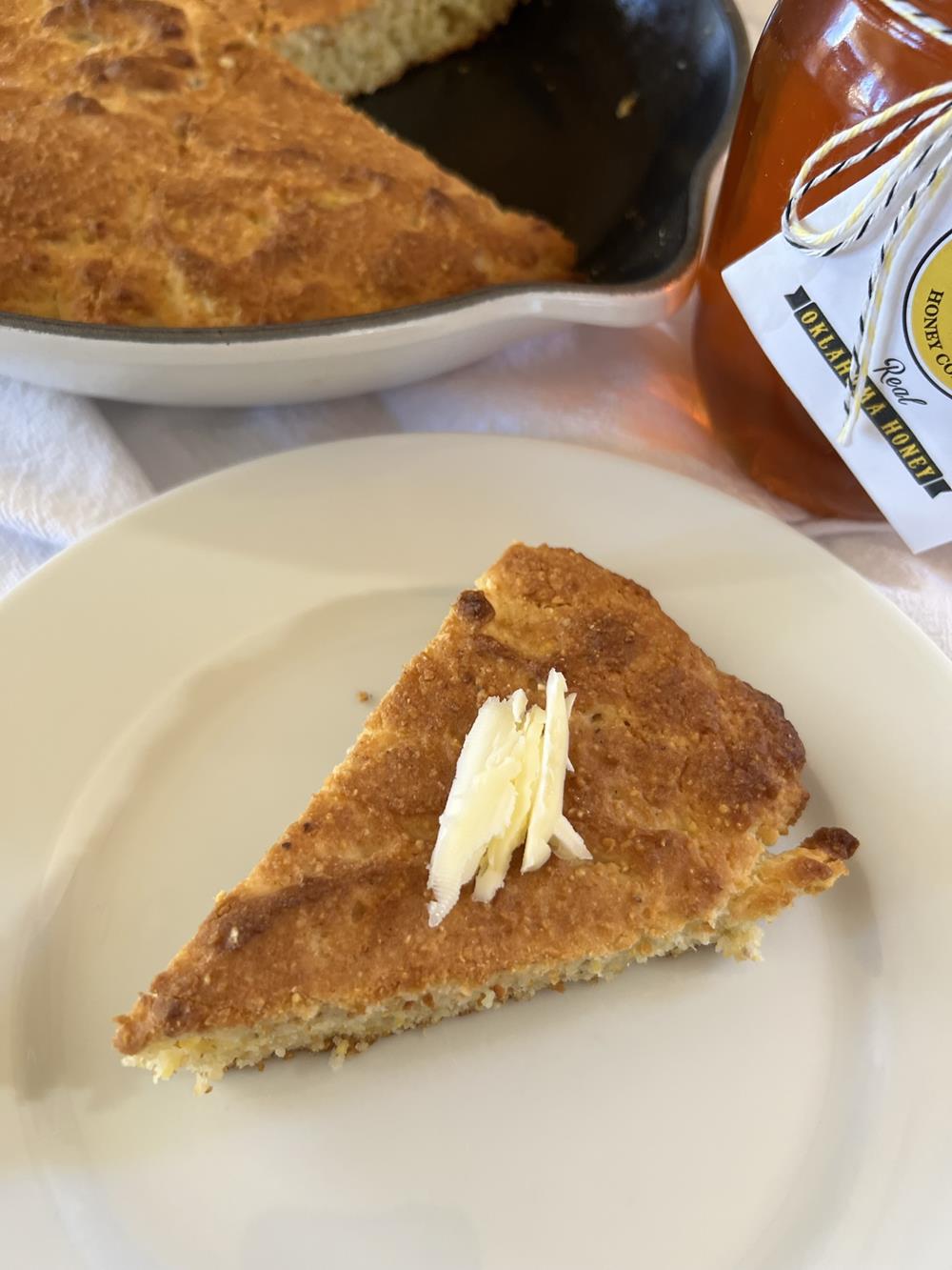 cornbread on a plate with butter