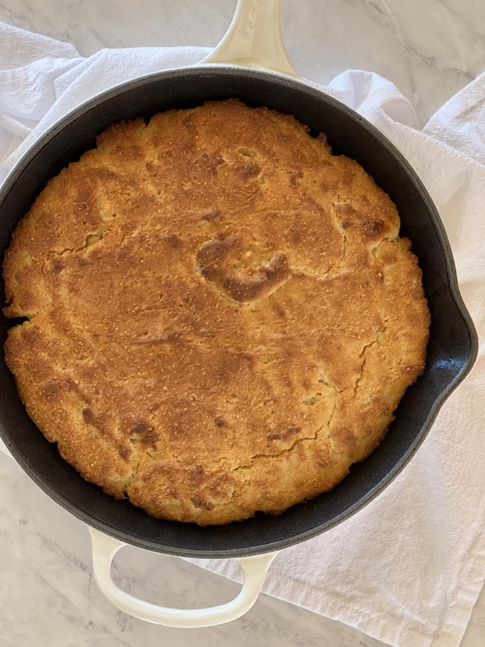 cooked cornbread in cast iron pan