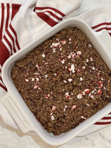 Chocolate Candy Cane Baked Oatmeal on a red and white background