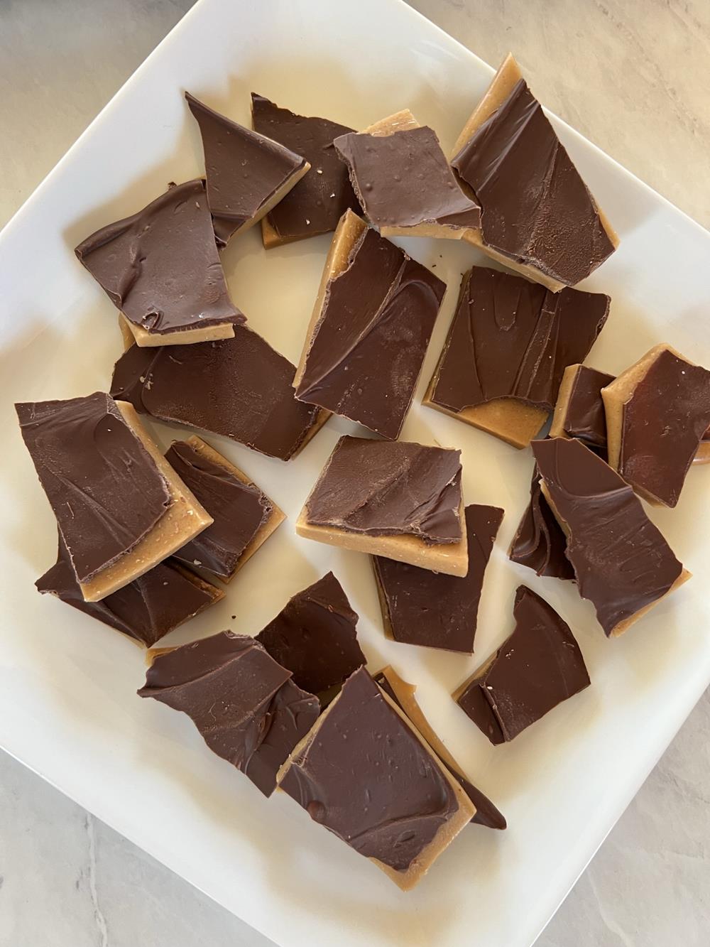 toffee candy pieces on white plate
