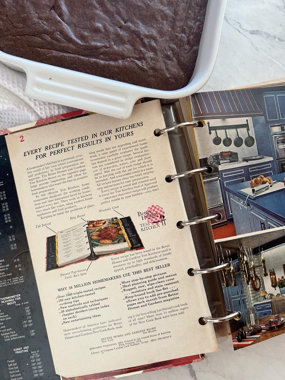 vintage cookbook and a pan of brownies